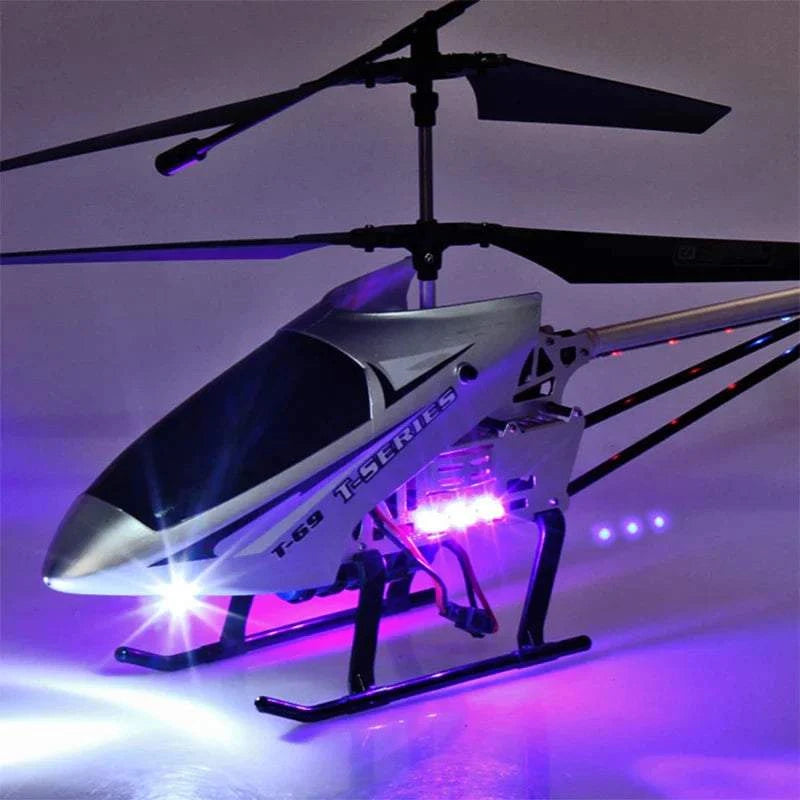 RC Helicopter with remote control, durable design, illuminated in the dark.