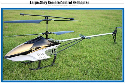 RC Helicopter on grass field, extra durable large design with remote control.