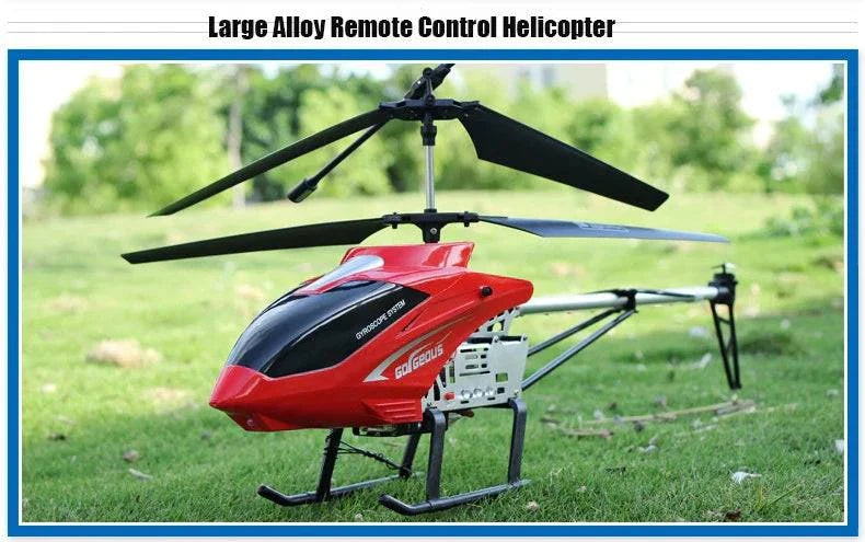 Large RC helicopter with alloy body on grassy field.